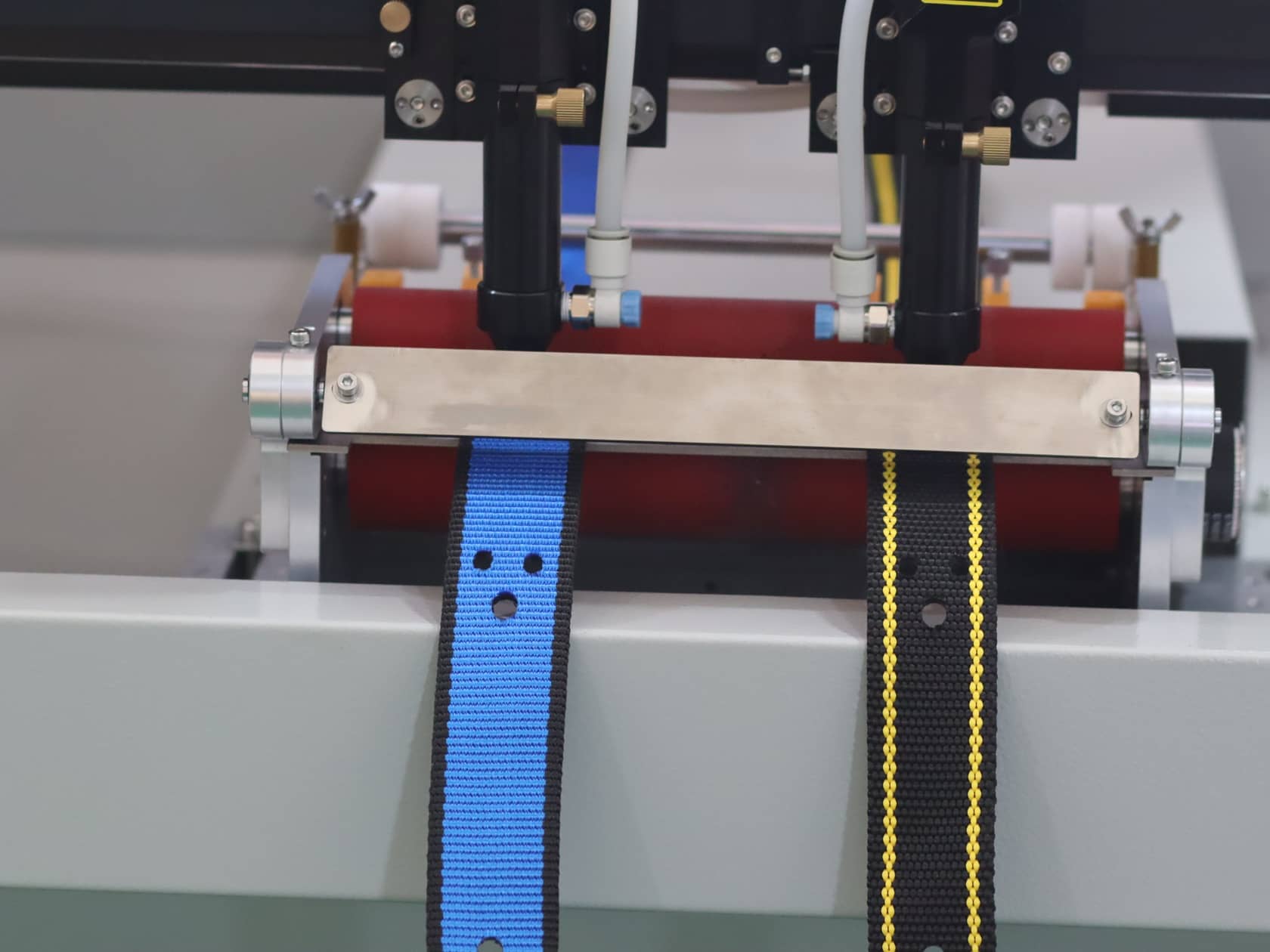 Automated webbing laser cutter